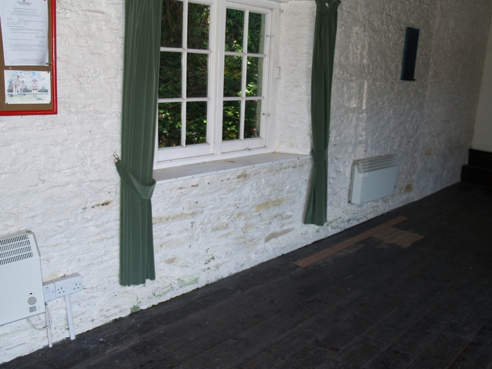 *Damp on inside of north wall-r